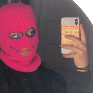 Custom hot pink smiley ski mask.